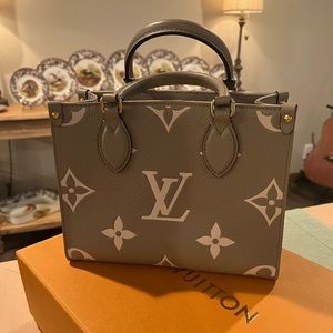 Louis Vuitton On the go PM tote M45779 HARDLY USED w/box, receipt, & bag
